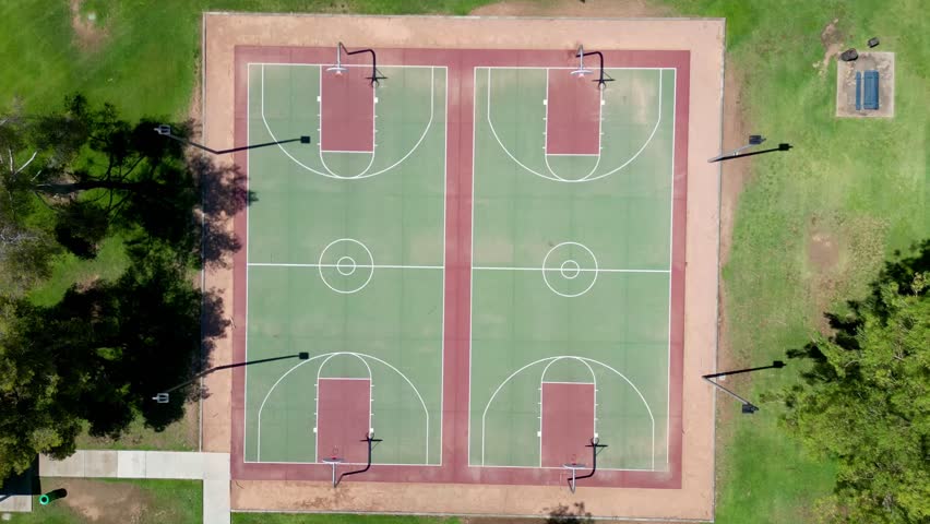 An aerial View of Multiple Outdoor Basketball Courts in a Park Setting at Jefferson Park in Mesa, Arizona