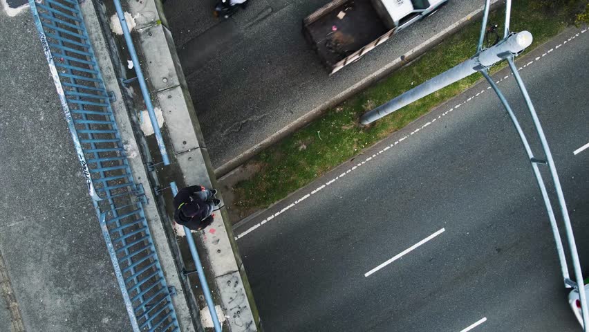 An aerial view of a man making a Parkour jump from the Bridge Medellin in Colombia - Powered by Shutterstock - Get 15% off with code: PIKWIZARD15