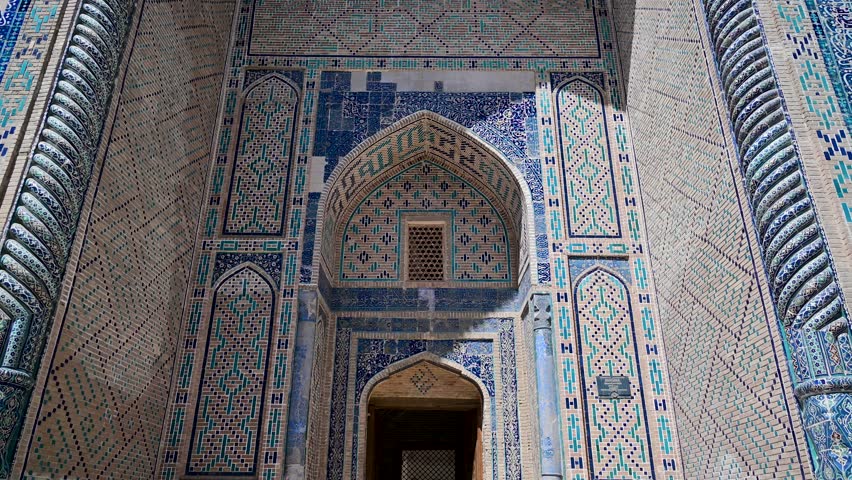 Beautiful ornate facade of the Ulugh Beg Madrasa in Bukhara, Uzbekistan