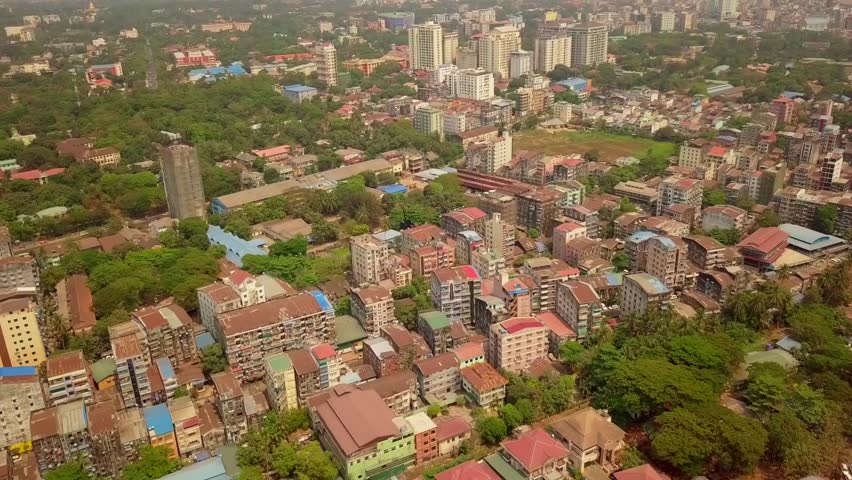  Futuristic aerial view panorama of developing Yangon city , Aerial view of Sule pagoda in downtown, Yangon, Myanmar. Sule Pagoda located in the heart of Yangon, Karaweik royal barge, Kandawgyi Lake, 