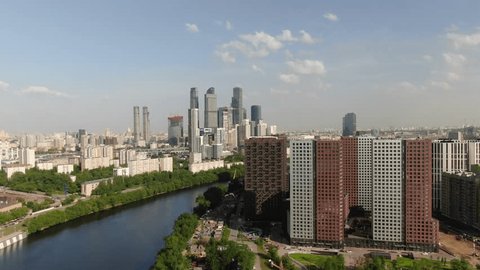 Aerial View Modern High Rise District near River