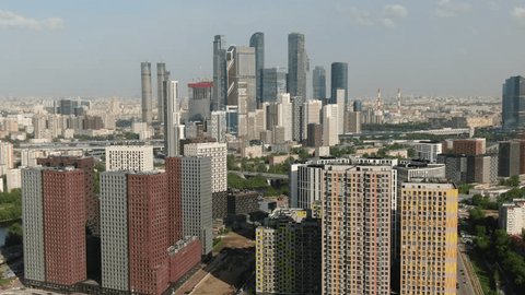 Aerial Lateral View City Towers near River