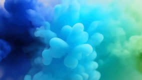 Vibrant swirls of blue and green ink blend and diffuse creating abstract ethereal cloud-like formations. - Powered by Shutterstock - Get 15% off with code: PIKWIZARD15