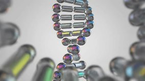 An abstract three dimensional rendering of a DNA double helix structure with iridescent spheres and cylindrical bars. - Powered by Shutterstock - Get 15% off with code: PIKWIZARD15
