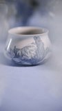 Porcelain Bowl on Soft Blue Table Setting - Powered by Shutterstock - Get 15% off with code: PIKWIZARD15