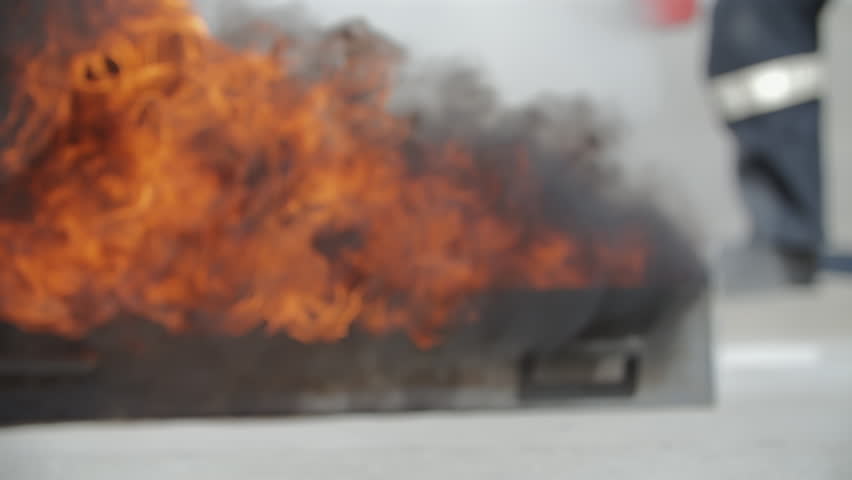 Extinguishing fire with fire extinguisher