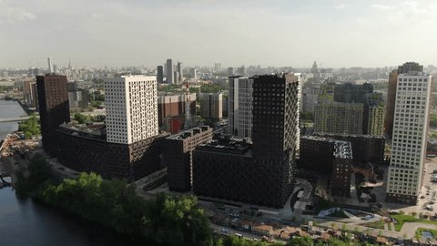 Drone Flight over Tall Residential Blocks along