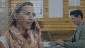 Woman answering ringing phone in cafe smiling, laughing during business call data charts over woman. Coffeeshop, remotework, coworking, hud, overlays, graphics, analytics - Powered by Shutterstock - Get 15% off with code: PIKWIZARD15