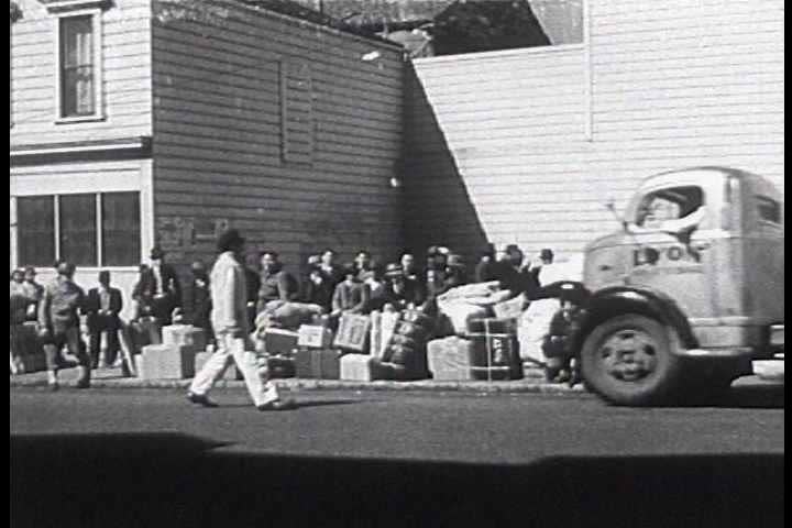 1940s - American propaganda film from 1942 describing internment of Japanese Americans in War Relocation Camps.