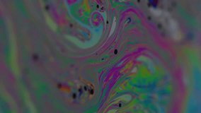 Vertical video. Soap colorful chaos. Paint blend. Vibrant wave curl liquid. Fantasy gradient mix gasoline drop floating abstract defocused background. - Powered by Shutterstock - Get 15% off with code: PIKWIZARD15