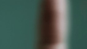 A close-up fingerprint presses against a digital control glass as biometric scanning lines illuminate, symbolizing modern security, surveillance, identification, and futuristic technology. - Powered by Shutterstock - Get 15% off with code: PIKWIZARD15