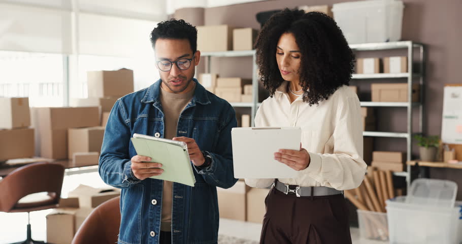 Tablet, clipboard and business people in office for supply chain, distribution or order inventory. Digital technology, checklist and logistics employees with discussion for ecommerce delivery.