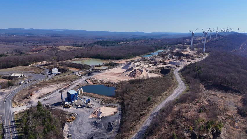 Aerial view of Mountaineer Wind Energy Center with quarry and hills in Thomas, WV, USA