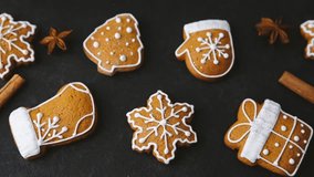 Festive holiday gingerbread cookies with icing on dark background - Powered by Shutterstock - Get 15% off with code: PIKWIZARD15