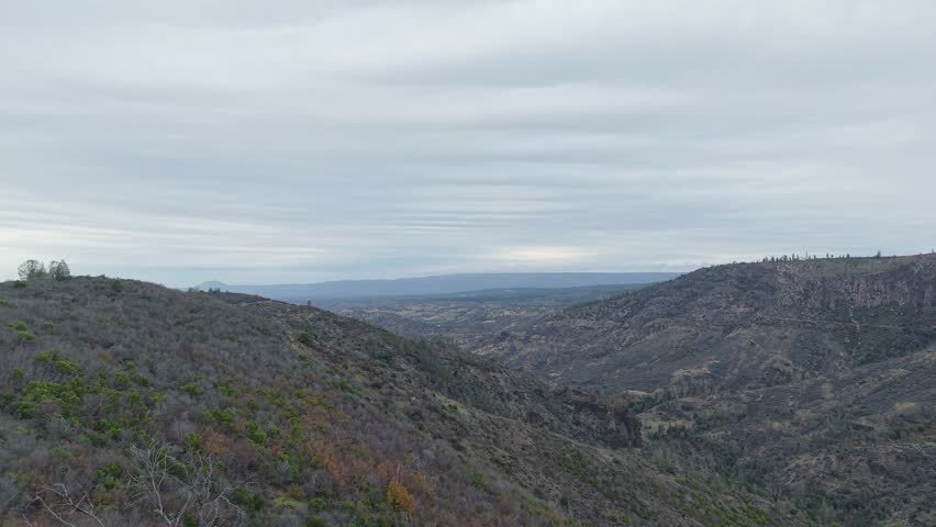 Flying above Paynes Creek Point, the footage uncovers vast open land, textured vegetation, and the subtle flow of the creek, illustrating a region rich in natural detail and space.