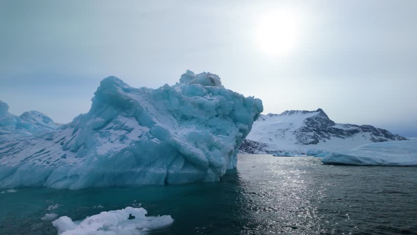 Scenic icebergs melting outside Nuuk, Greenland, peaceful coastal view