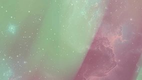 A soft pastel galaxy animation featuring glowing nebula clouds and floating star particles. Ideal for dreamy visuals, creative projects, and modern digital designs. - Powered by Shutterstock - Get 15% off with code: PIKWIZARD15