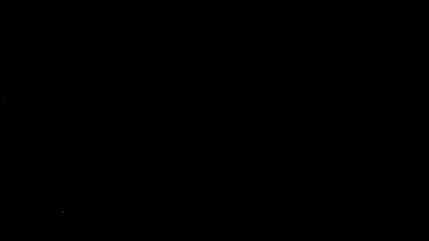 Super Slow Motion Shot of Real Side-Flying Glass Shards Isolated on Black at 1000 fps.