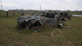 rusted vintage car wreck in field salvage hunter inspection shows crumpled hood, peeling paint, overgrown - Powered by Shutterstock - Get 15% off with code: PIKWIZARD15