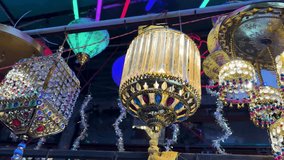 decorative hanging lanterns displayed at festive market stall for retail sale - Powered by Shutterstock - Get 15% off with code: PIKWIZARD15