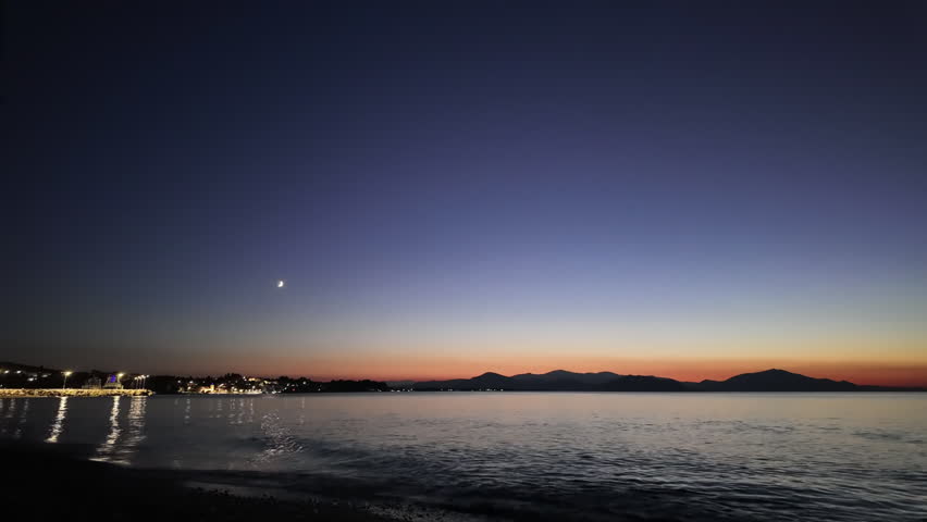 Milky Way stars on a dark cloudy countryside skies. Time-lapse video.	
