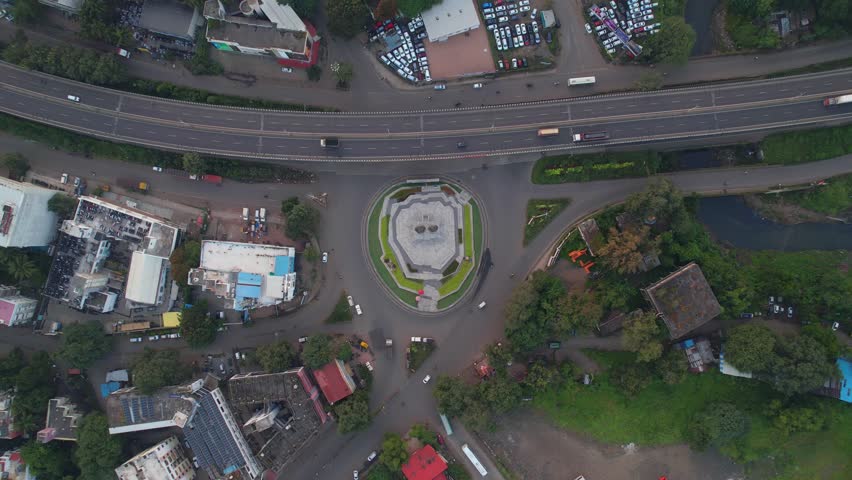 Aerial of Mumbai Naka circle, Mumbai Agra National highway crossing through Tier 2 Nashik city elevated corridor flyover, Maharashtra