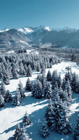 Aerial view of mountain valley with snow