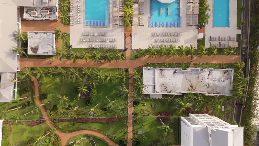 Aerial View Of Pools, Trees and White Sand Beach In Jamaica