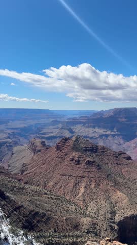 Panning across the Grand Canyon with snow in Arizona, USA