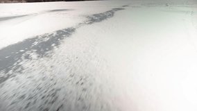Having fun and skating on frozen river in winter holidays. POV gliding over scratched ice, closeup of skate tracks on frozen pond, winter activity - Powered by Shutterstock - Get 15% off with code: PIKWIZARD15
