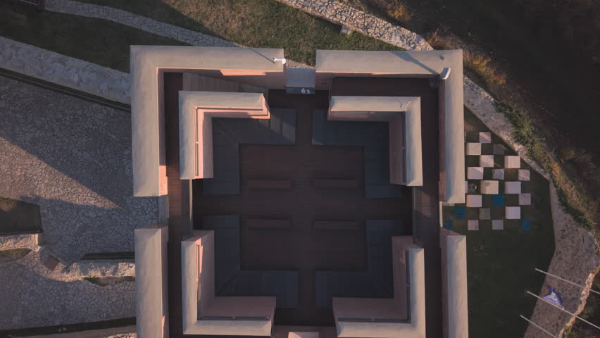 Golden hour drone ascent and circle over Medvedgrad fortress tower and Altar of the Homeland, Zagreb