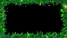 A festive seasonal frame featuring spruce and pine boughs, snowflakes, and twinkling lights. A kaleidoscope of glitter, shimmer, sparkle, and snow. Animated loop in 4K resolution. - Powered by Shutterstock - Get 15% off with code: PIKWIZARD15