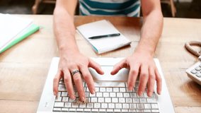Man typing on laptop at desk, causing animated green avatar links growing tech network for work. Office, workspace, computer, device, collaboration, connectivity, icons - Powered by Shutterstock - Get 15% off with code: PIKWIZARD15
