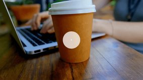 Woman typing on laptop, lifting cup and sipping while tech nodes starting on cup spreading. Patio, cafe, remote, work, coffee, overlay, network - Powered by Shutterstock - Get 15% off with code: PIKWIZARD15