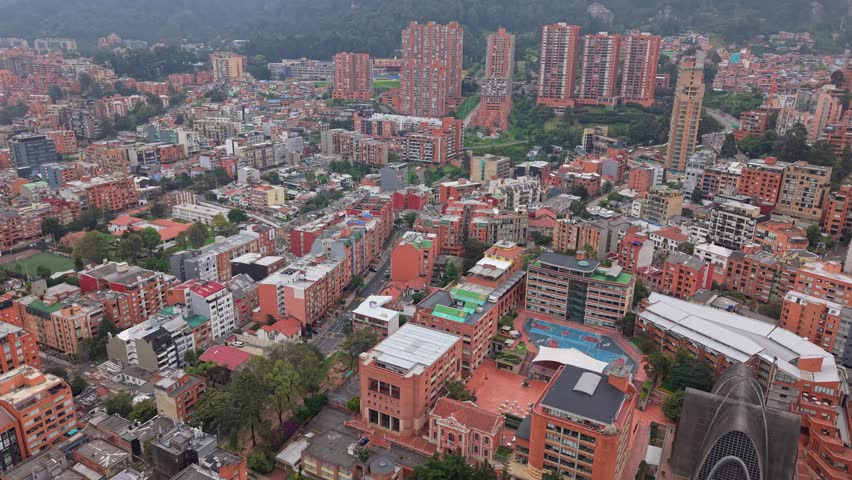 Aerial view of urban Bogotá highlighting La Salle University buildings