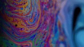 Vertical video. Holographic swirl. Gasoline paint. Color soap spill film multilayer art reflection. Bright mix defocused abstract texture background. - Powered by Shutterstock - Get 15% off with code: PIKWIZARD15