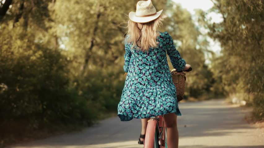Woman Riding Bicycle On Rural Road. Female Cyclist In Summer Dress. Outdoor Recreation And Leisure Activity, Vintage Bike With Basket, Summer Travel And Active Holiday Cycling Adventure Summer Fun