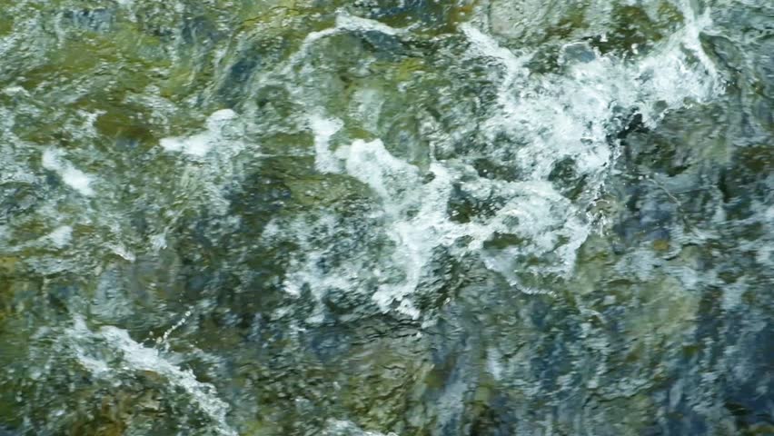 Slow Motion Top View of Foamy Rapid River Flow