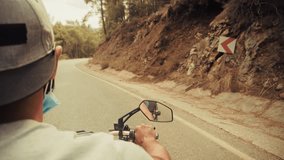 Motorcycle Rider On Mountain Road Corner. POV View Of Biker Driving On Scenic Route, Summer Travel Adventure And Freedom, Man Wearing Protective Face Mask, Road Trip On Winding Highway. Transport Ride - Powered by Shutterstock - Get 15% off with code: PIKWIZARD15