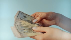 Counting Fifty Dollar Bills. Hands Handling United States Currency. Financial Management Money Counting Income And Wealth Calculation, Business Transaction Payment, Budgeting Payroll Payment Cash Flow - Powered by Shutterstock - Get 15% off with code: PIKWIZARD15