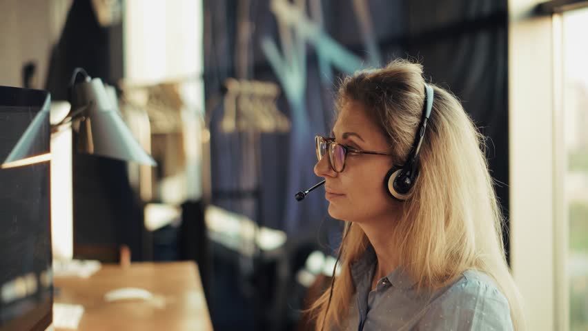 Female Customer Service Agent Wearing Headset. Call Center Operator Help Desk Employee, Remote Support And Online Consultation, Telemarketing And Business Communication. Technical Support Specialist - Powered by Shutterstock - Get 15% off with code: PIKWIZARD15