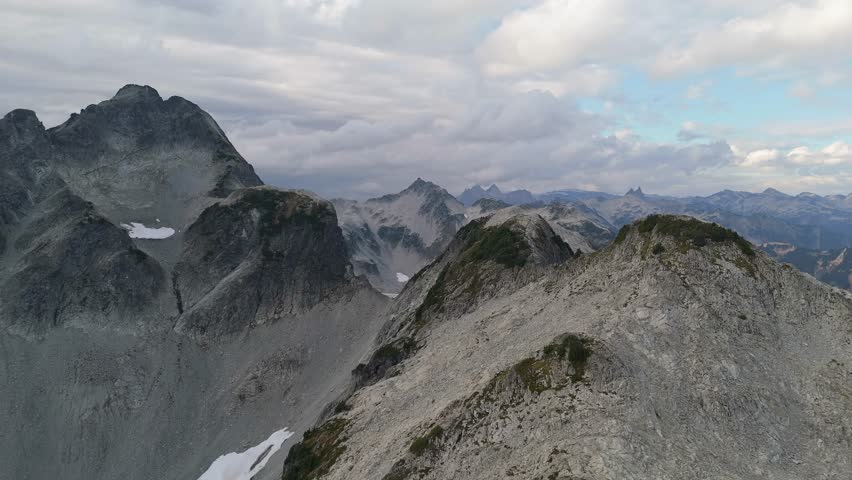 Majestic Mountain Range and Cloud-Kissed Peaks in British Columbia, Canada
