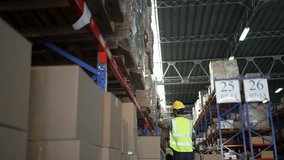 Blue collar workers are working at warehouse. Logistics, transportation. - Powered by Shutterstock - Get 15% off with code: PIKWIZARD15