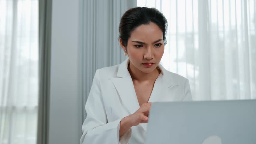 Stressful businesswoman looking at debt bill invoice notification, faces bankruptcy due to overwhelming debt, expenses and economic crisis from bad corporate financial and loan pay management. Vivancy