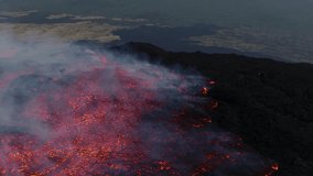 Etna on August 20, 2025. Effusive activity with lava flows, caves, spattering, hornito, and explosions from the southeast crater. Sunset with incandescent lava in Sicily. - Powered by Shutterstock - Get 15% off with code: PIKWIZARD15