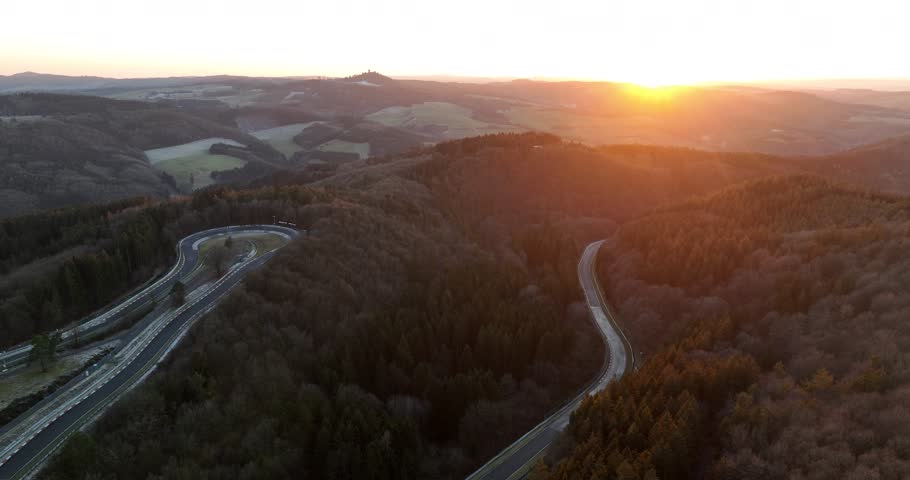 An aerial view of the Nurburgring racecourse in the town of Nurburg, Rhineland-Palatinate, Germany at sunset