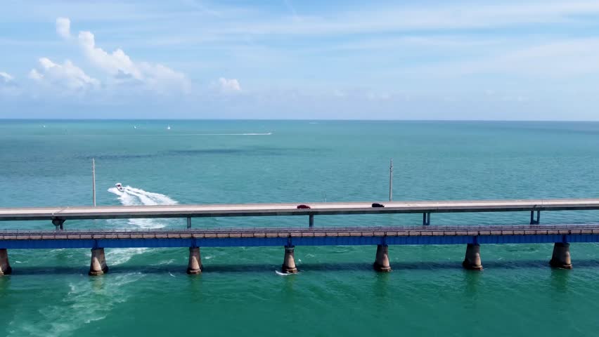 Flyover Seven Mile Bridge in Florida which connects several of the Florida Keys on the way to Key West. Florida Keys 2025 drone shots flying over new Seven mile bridge