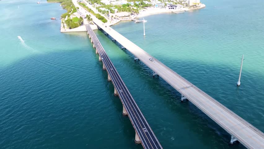 Cinematic Aerial shot of the Seven Mile Bridge in Florida which connects several of the Florida Keys on the way to Key West. Florida Keys 2025 drone shots flying over new Seven mile bridge