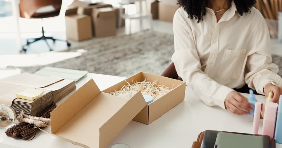 Hands, person and packing box for ecommerce with skincare product, online order and delivery. Entrepreneur, package and prepare parcel with cosmetics, supply chain and supplier for cargo distribution