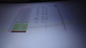 Low-angle view of computer screen showing torrent client software with multiple files seeding, one file displaying error files missing from job, please recheck, close-up. Shooting in slow motion. - Powered by Shutterstock - Get 15% off with code: PIKWIZARD15